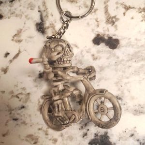 3D Smoking Skeleton on a Bike Hard Rubber Key Ring.